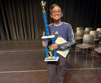  image of faizan and his trophy